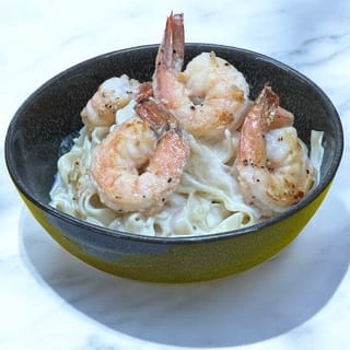 Shrimp Alfredo (parm wheel twist)